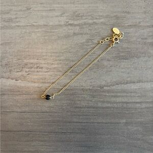 Judith Bright Gold Bracelet with Black Stone